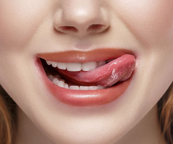 Girl licking lips