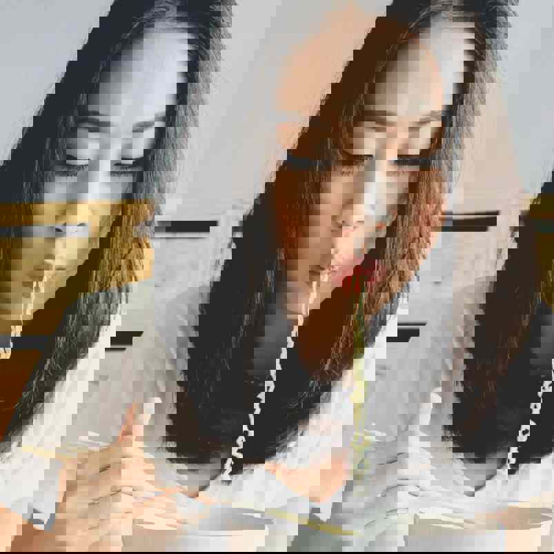 Person eating noodles